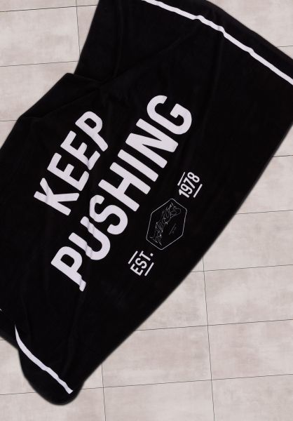 TITUS-Verschiedenes-KEEP-PUSHING-Beach-Towel-180x100cm-black-Unteransicht_600x600.jpg
